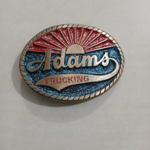 Adams Trucking vintage belt buckle – front view