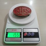 ADWOC vintage belt buckle – on scale showing weight