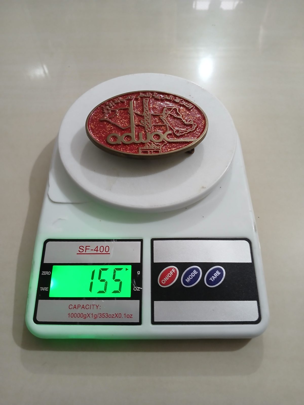 ADWOC Vintage Belt Buckle – On scale showing weight ADWOC vintage belt buckle – on scale showing weight