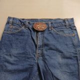 AM General Advanced Mobility vintage belt buckle – worn on belt with jeans