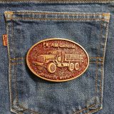 AM General Advanced Mobility vintage belt buckle – on jeans back pocket