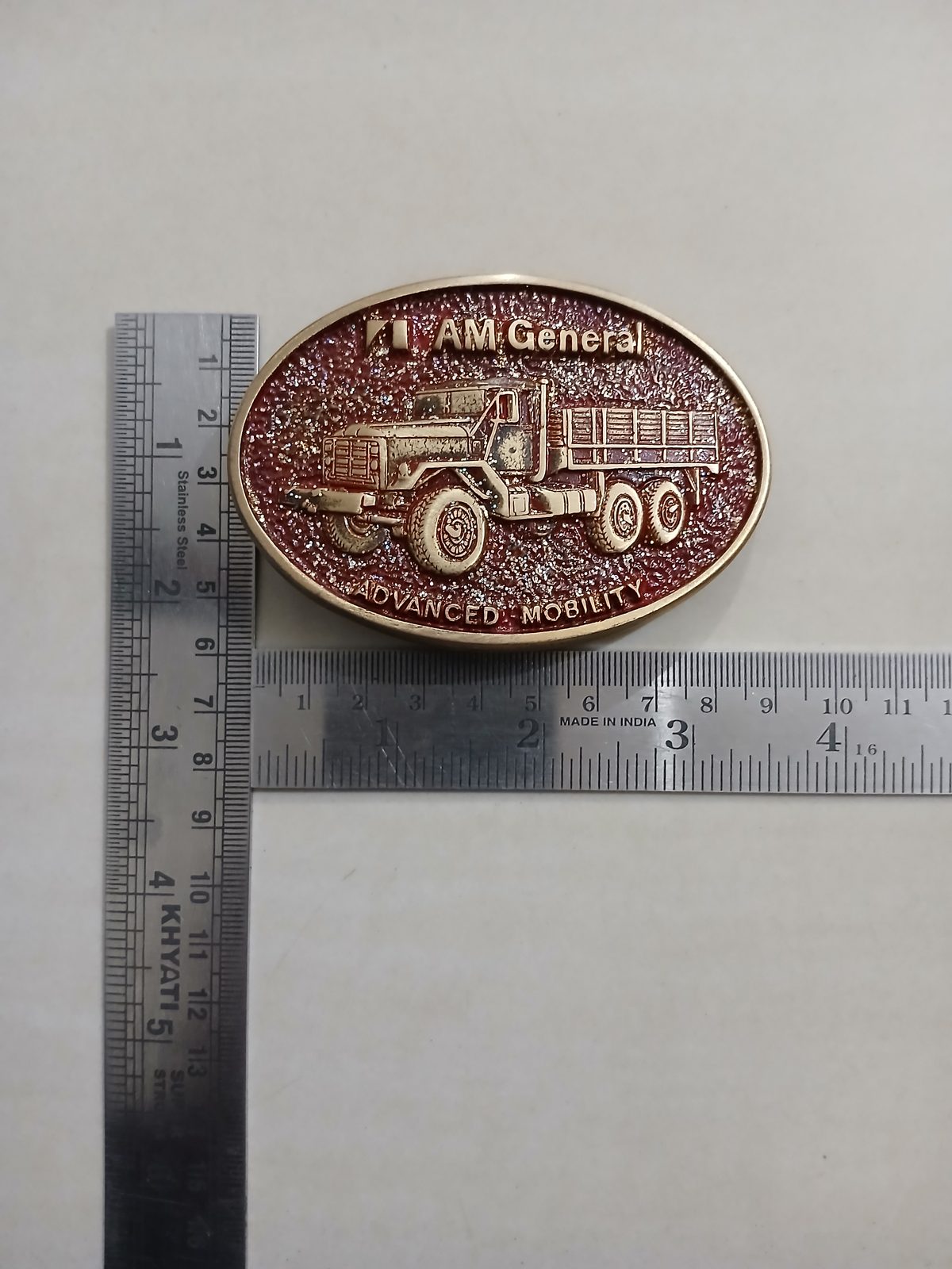 AM General Advanced Mobility Vintage Belt Buckle – With ruler for size AM General Advanced Mobility vintage belt buckle – with ruler for size