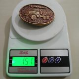 AM General Advanced Mobility vintage belt buckle – on scale showing weight