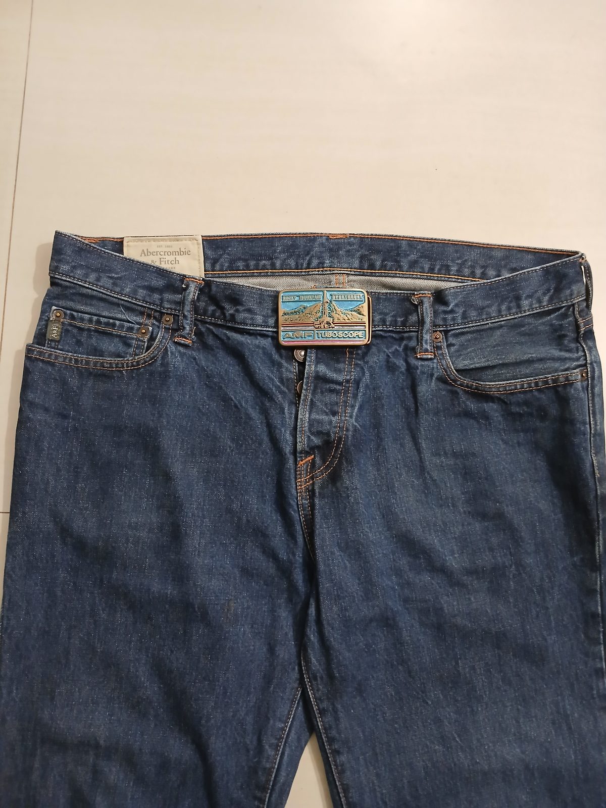 AMF Tuboscope Vintage Belt Buckle – Worn on belt with jeans AMF Tuboscope vintage belt buckle – worn on belt with jeans