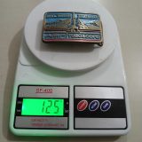 AMF Tuboscope vintage belt buckle – on scale showing weight