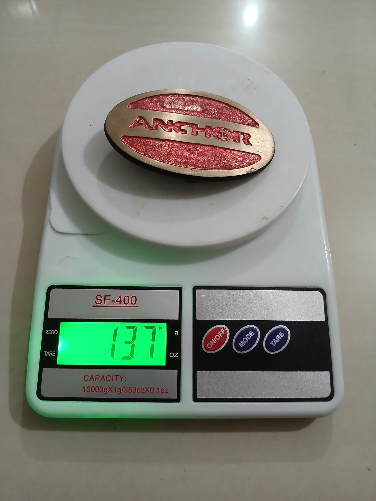 Anchor Hocking Vintage Belt Buckle – On scale showing weight Anchor Hocking vintage belt buckle – on scale showing weight