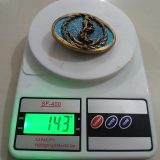 Anchor vintage belt buckle – on scale showing weight