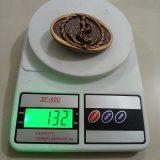 Anchor vintage belt buckle – on scale showing weight