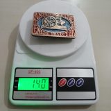 Antique Engine Collectors vintage belt buckle – on scale showing weight