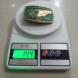 Appalachian Exploration Inc vintage belt buckle – on scale showing weight