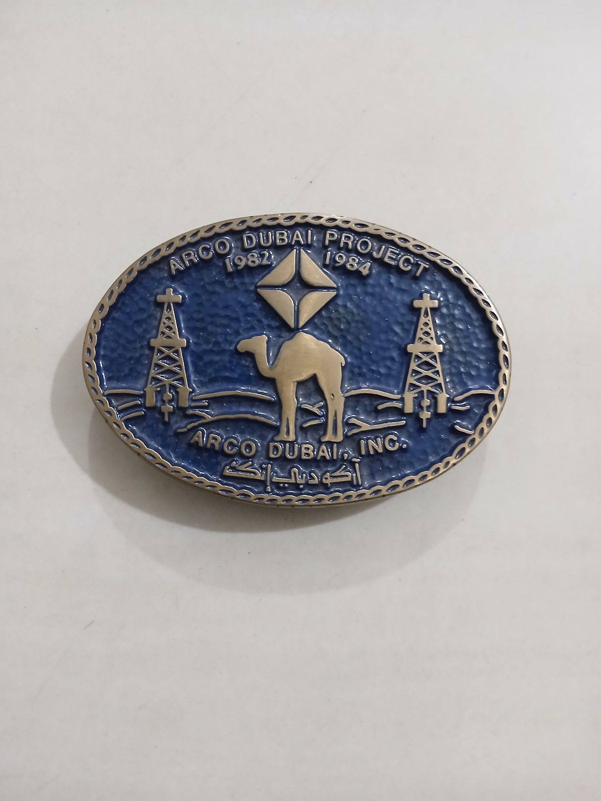 ARCO Dubai Inc Camel Vintage Belt Buckle – Front view ARCO Dubai Inc Camel vintage belt buckle – front view