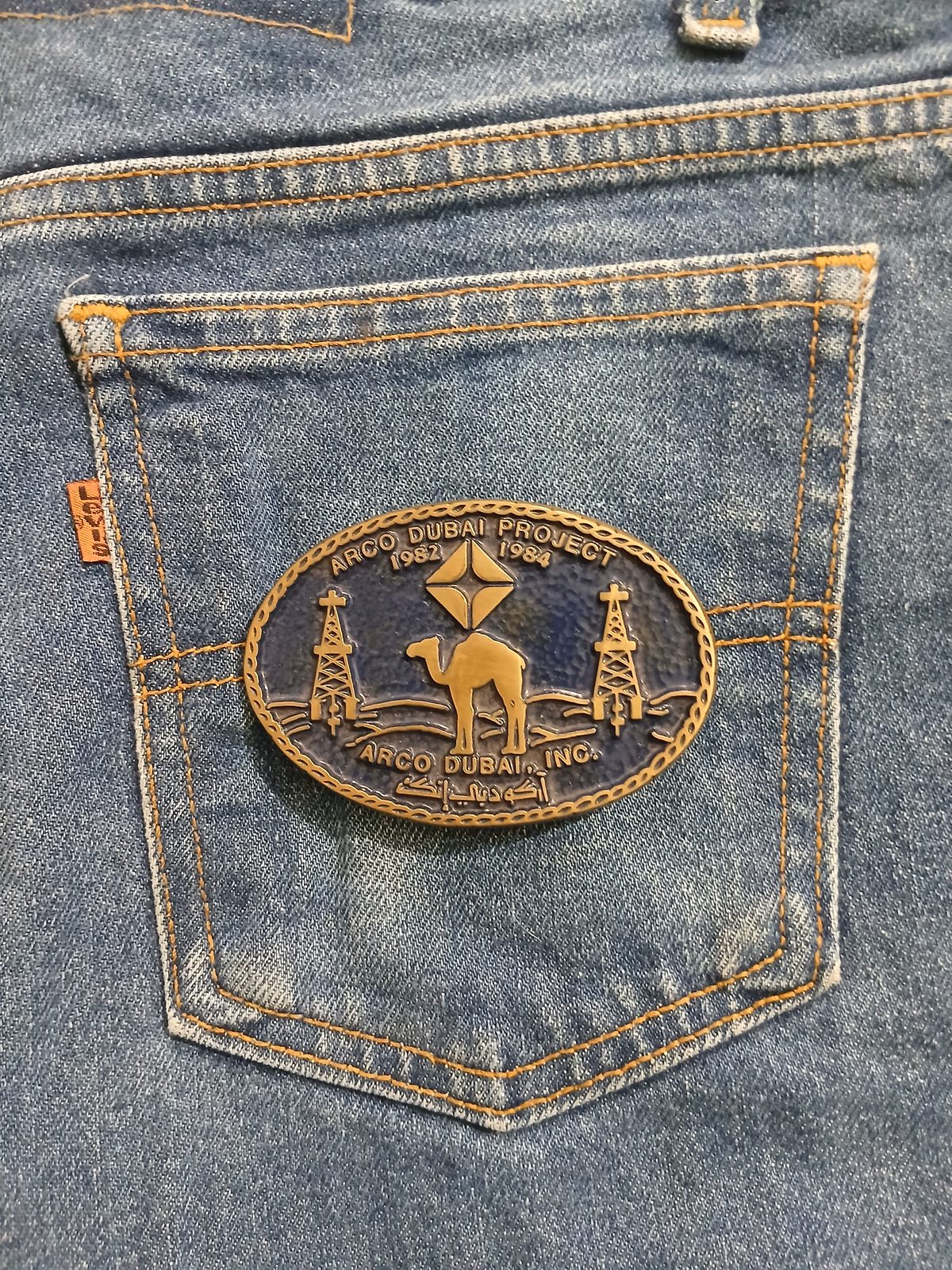 ARCO Dubai Inc Camel Vintage Belt Buckle – On jeans back pocket ARCO Dubai Inc Camel vintage belt buckle – on jeans back pocket