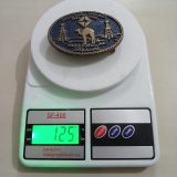 ARCO Dubai Inc Camel vintage belt buckle – on scale showing weight