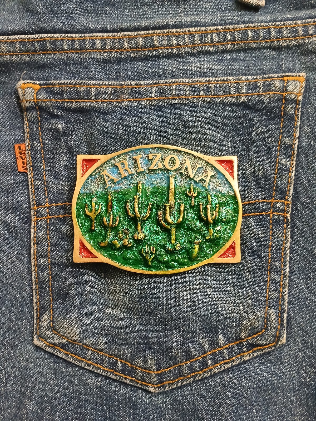 Arizona Saguaro Cactus Vintage Belt Buckle – On jeans back pocket Arizona Saguaro Cactus vintage belt buckle – on jeans back pocket
