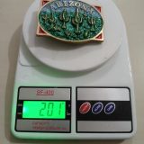 Arizona Saguaro Cactus vintage belt buckle – on scale showing weight