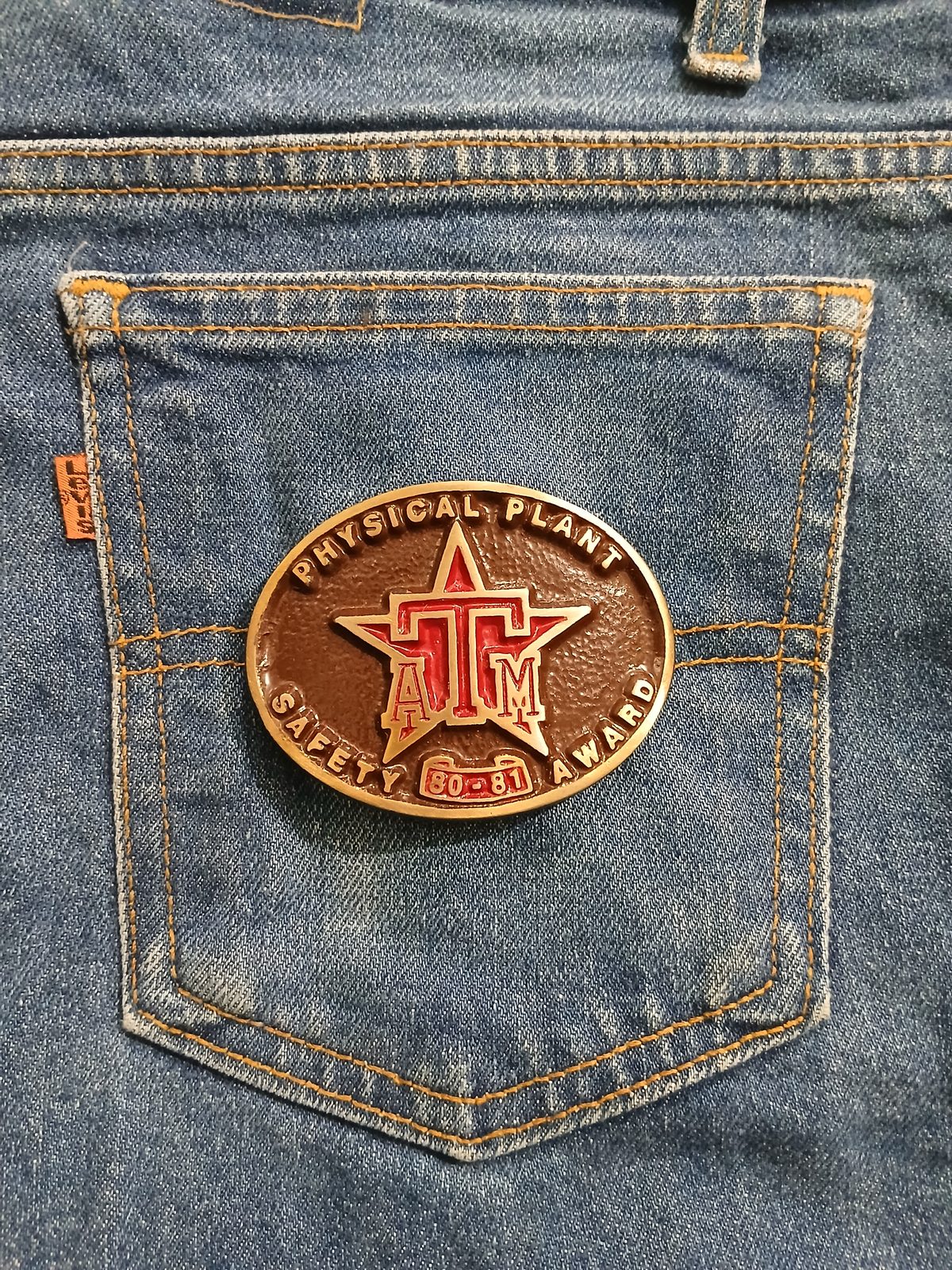 ATM Safety Award 80-81 Vintage Belt Buckle – On jeans back pocket ATM Safety Award 80-81 vintage belt buckle – on jeans back pocket