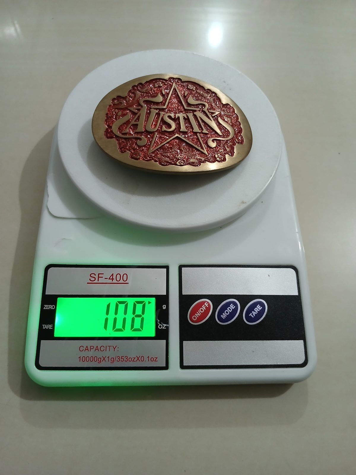 Austin Vintage Belt Buckle – On scale showing weight Austin vintage belt buckle – on scale showing weight