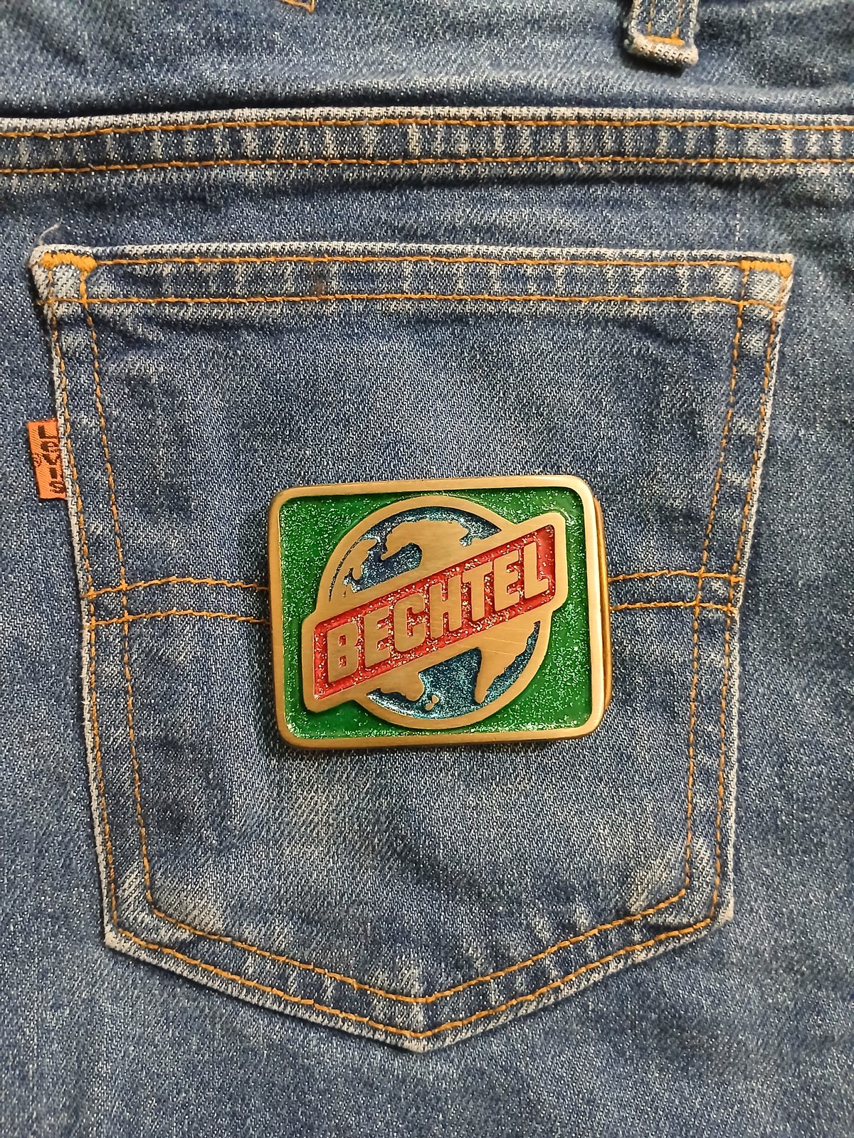 Bechtel Vintage Belt Buckle – On jeans back pocket Bechtel vintage belt buckle – on jeans back pocket