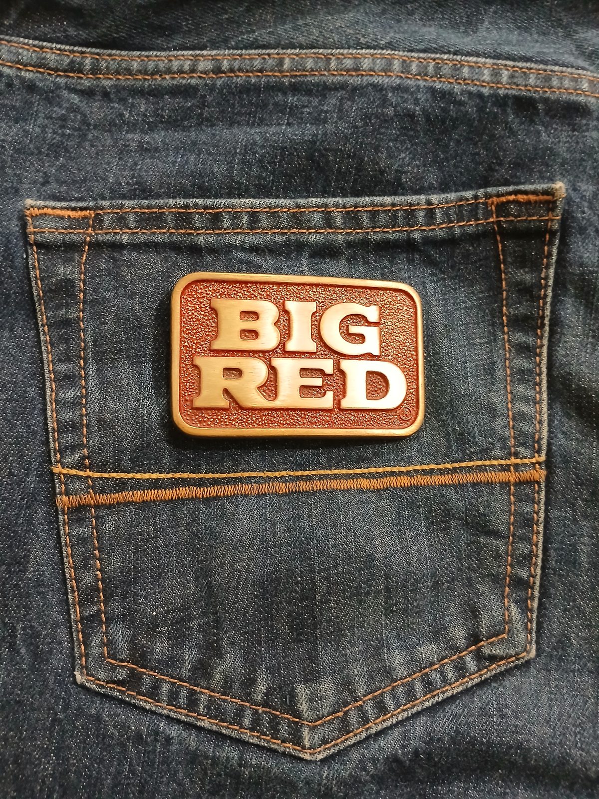 Big Red Vintage Belt Buckle – On jeans back pocket Big Red vintage belt buckle – on jeans back pocket