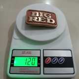 Big Red vintage belt buckle – on scale showing weight