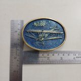 Biplane vintage belt buckle – with ruler for size