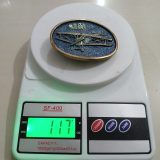 Biplane vintage belt buckle – on scale showing weight