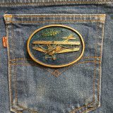 Biplane vintage belt buckle – on jeans back pocket