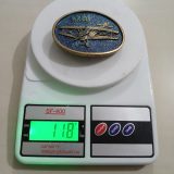 Biplane vintage belt buckle – on scale showing weight