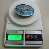 Biplane vintage belt buckle – on scale showing weight