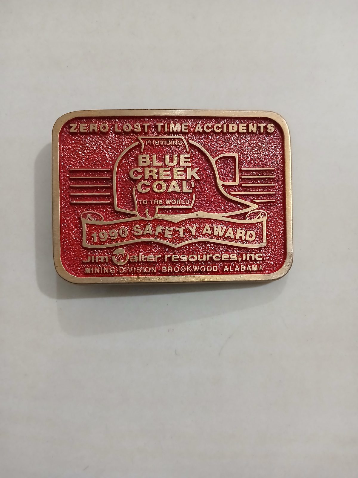 Blue Creek Coal Jim Walter 1990 Safety Award Vintage Belt Buckle – Front view Blue Creek Coal Jim Walter 1990 Safety Award vintage belt buckle – front view