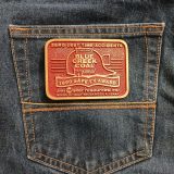 Blue Creek Coal Jim Walter 1990 Safety Award vintage belt buckle – on jeans back pocket