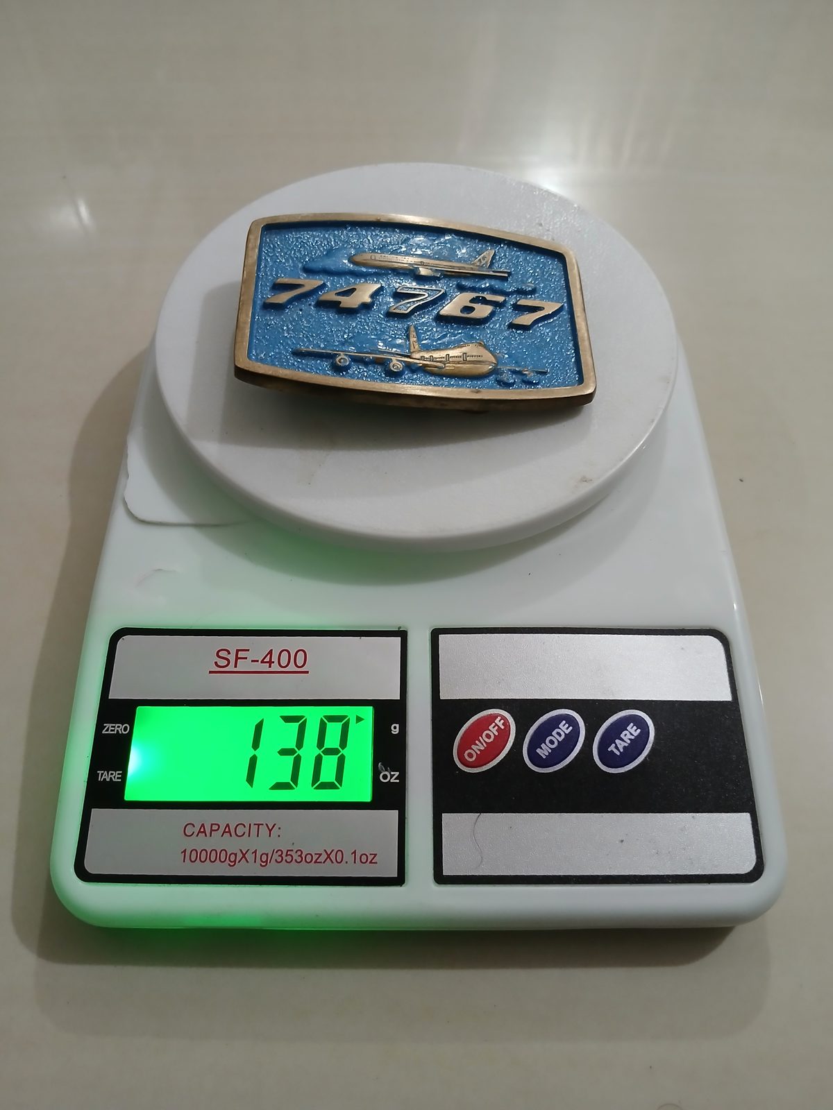 Boeing 747 767 Vintage Belt Buckle – On scale showing weight Boeing 747 767 vintage belt buckle – on scale showing weight