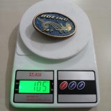 Boeing 747 vintage belt buckle – on scale showing weight