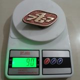 Boeing 767 vintage belt buckle – on scale showing weight