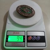 BOT Oil Tools vintage belt buckle – on scale showing weight