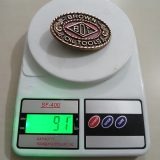 BOT Oil Tools vintage belt buckle – on scale showing weight