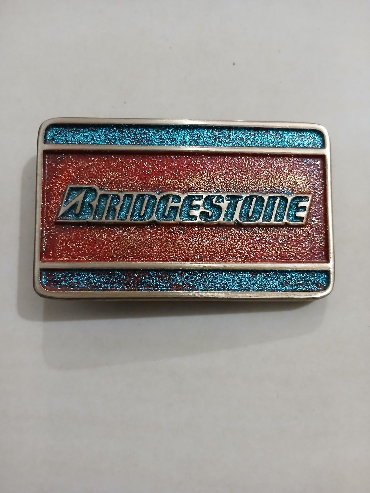 Bridgestone Vintage Belt Buckle – Front view Bridgestone vintage belt buckle – front view