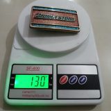 Bridgestone vintage belt buckle – on scale showing weight