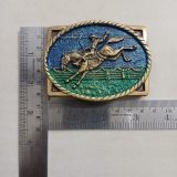 Bronc Rider vintage belt buckle – with ruler for size