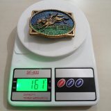 Bronc Rider vintage belt buckle – on scale showing weight