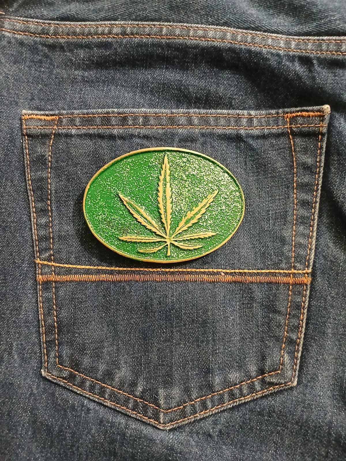 Cannabis Leaf Vintage Belt Buckle – On jeans back pocket Cannabis Leaf vintage belt buckle – on jeans back pocket