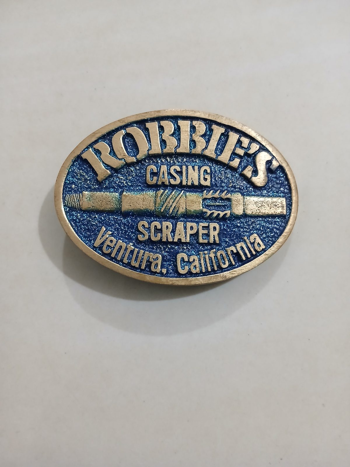 Casing Scraper Ventura California Vintage Belt Buckle – Front view Casing Scraper Ventura California vintage belt buckle – front view
