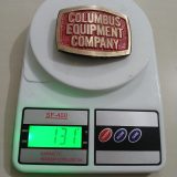 Columbus Equipment Company vintage belt buckle – on scale showing weight