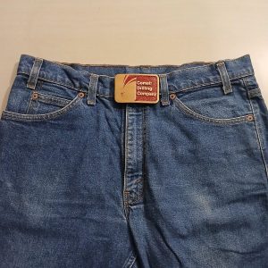 Comet Drilling Company vintage belt buckle – worn on belt with jeans