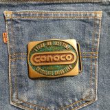 Conoco Chocolate Bayou 1982 vintage belt buckle – on jeans back pocket