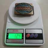 Conoco Chocolate Bayou 1982 vintage belt buckle – on scale showing weight