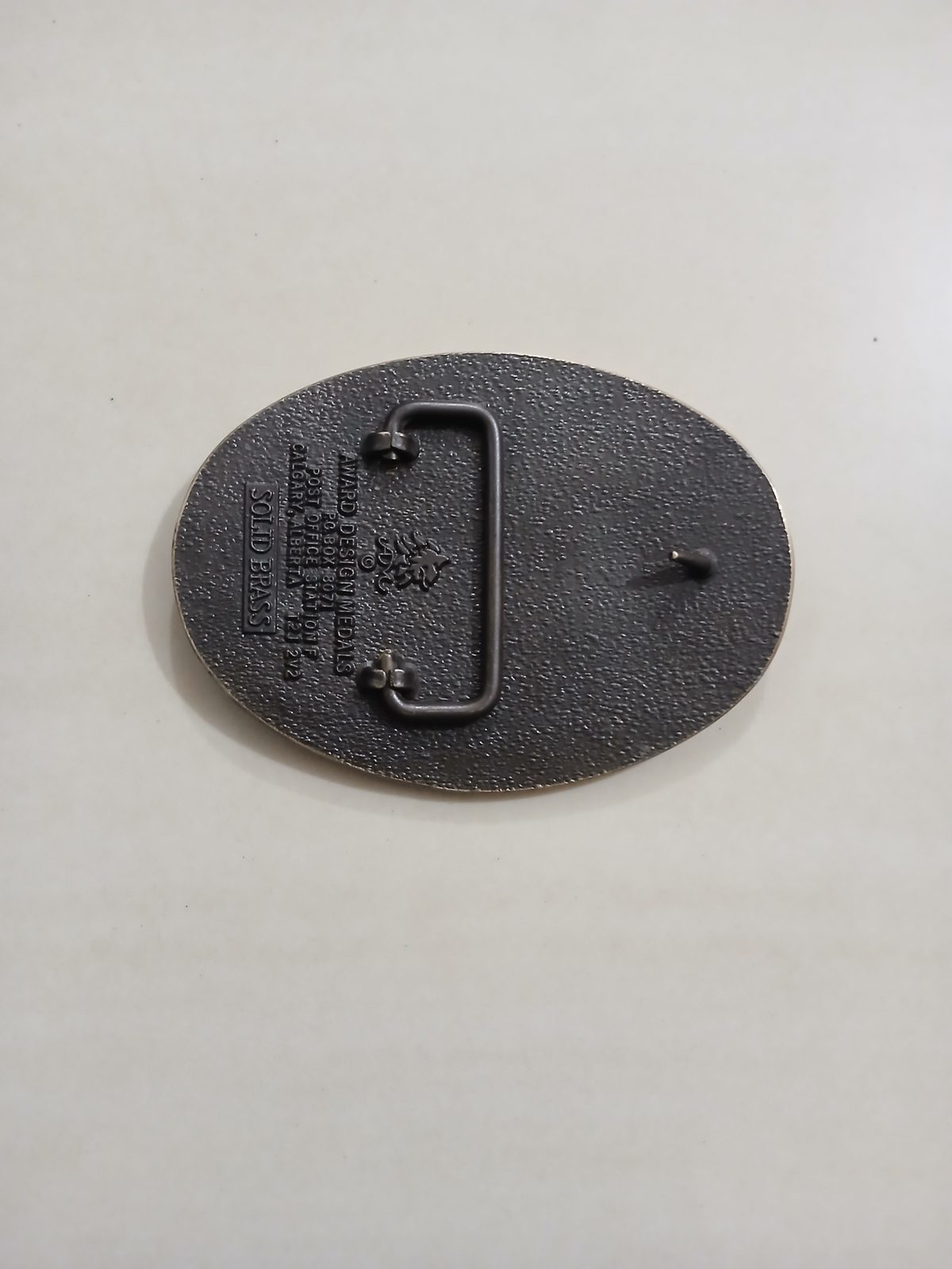 Country 105 CKRY FM Vintage Belt Buckle – Back view Country 105 CKRY FM vintage belt buckle – back view