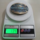 Country 105 CKRY FM vintage belt buckle – on scale showing weight