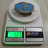 Crawford International Inc vintage belt buckle – on scale showing weight