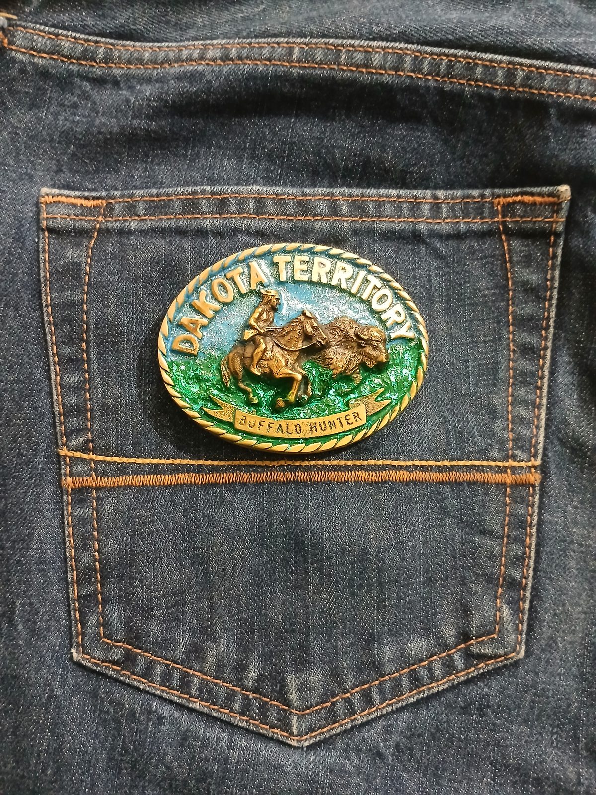 Dakota Territory Buffalo Hunter Vintage Belt Buckle – On jeans back pocket Dakota Territory Buffalo Hunter vintage belt buckle – on jeans back pocket